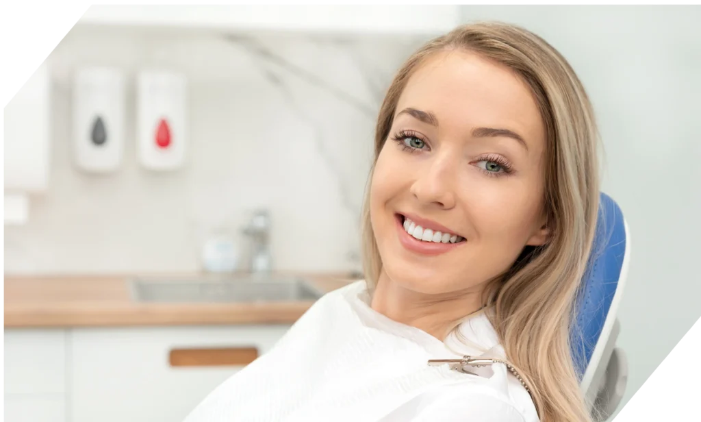 Woman smiling at orthodontist